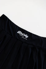 Women's water-resistant golf skort side view — four-way stretch — Bherdy Golf