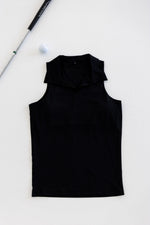 Women golfer wearing Bherdy Performance Collared Tank on the course