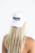 Women's white golf trucker hat — athletic performance hat — Bherdy Golf