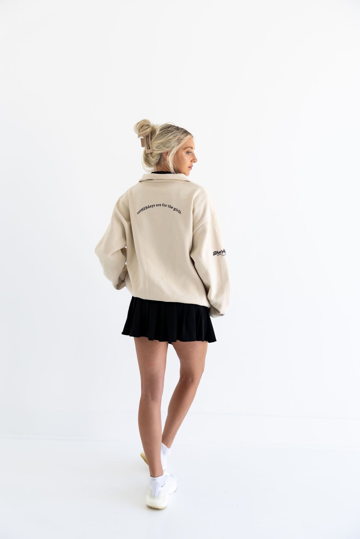 Women's collared golf crewneck detail — button collar close-up — Bherdy Golf